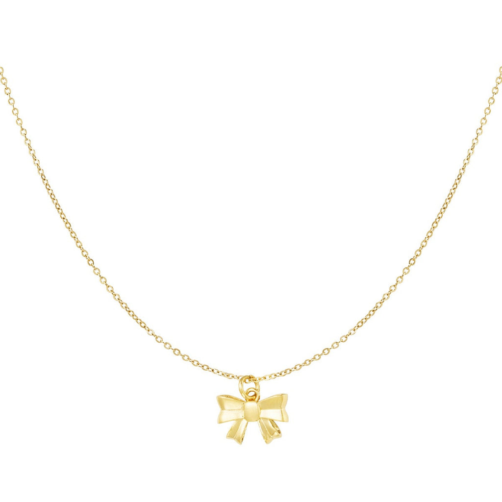 A delicate gold chain necklace featuring a small bow-shaped pendant, displayed against a solid white background.
